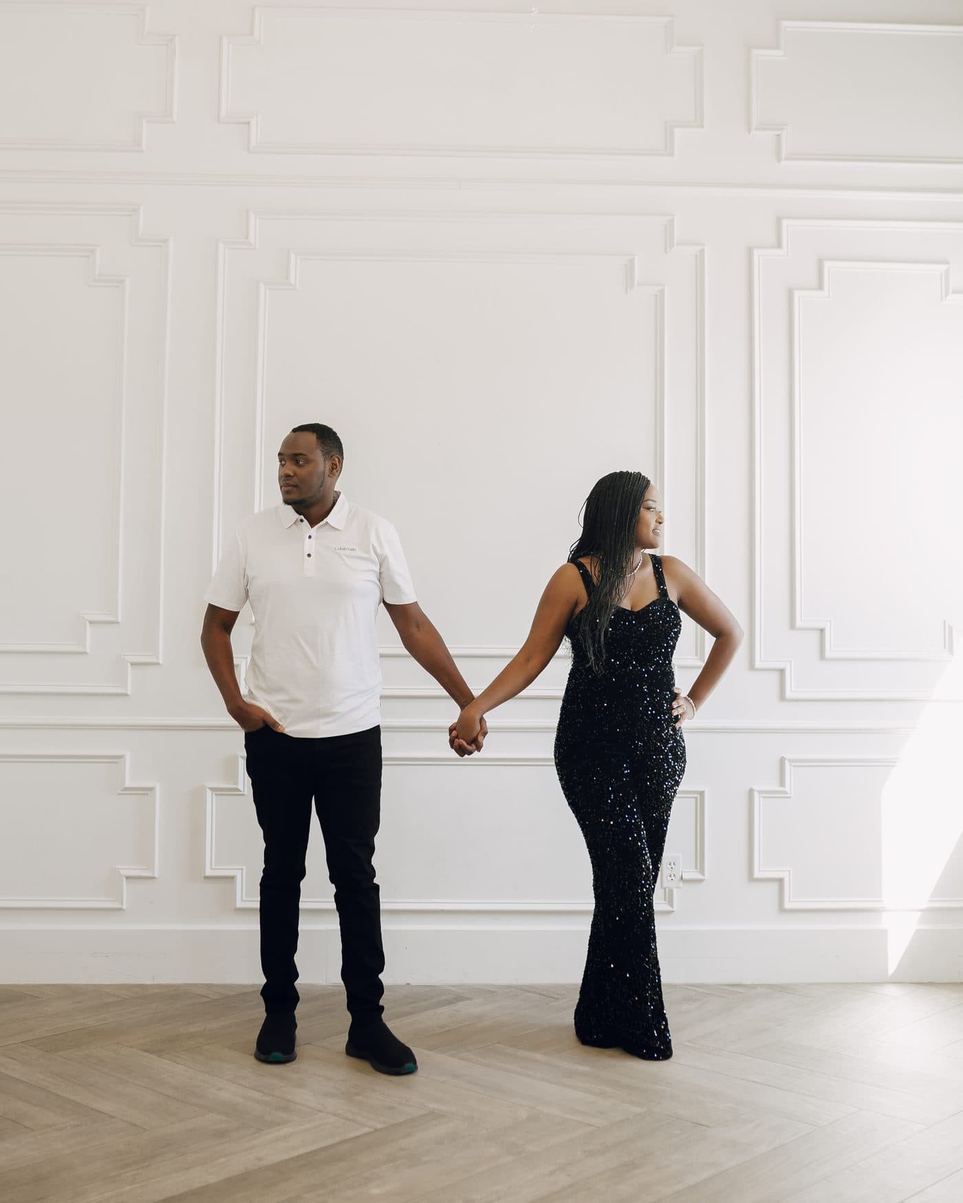 The husband-and-wife owners of 3U3 Cleaning, standing hand in hand